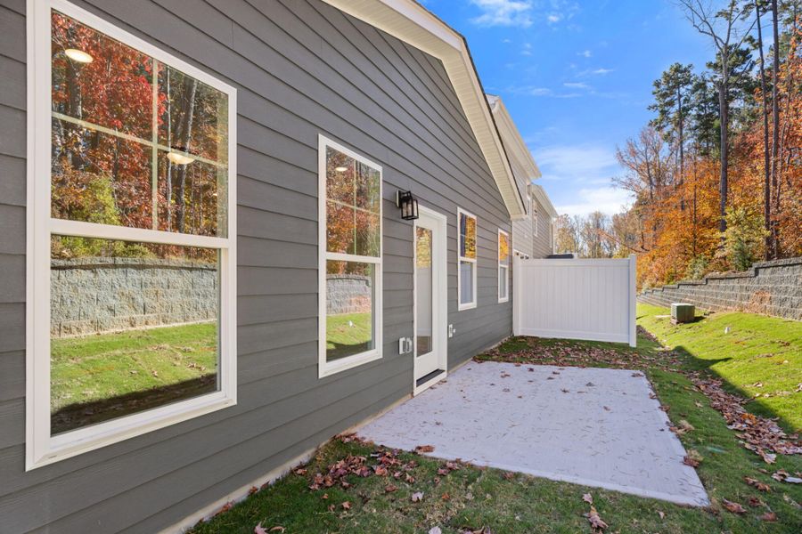 Exterior details and patio area of a home in Harbor Crossing, Greensboro (Image 4).