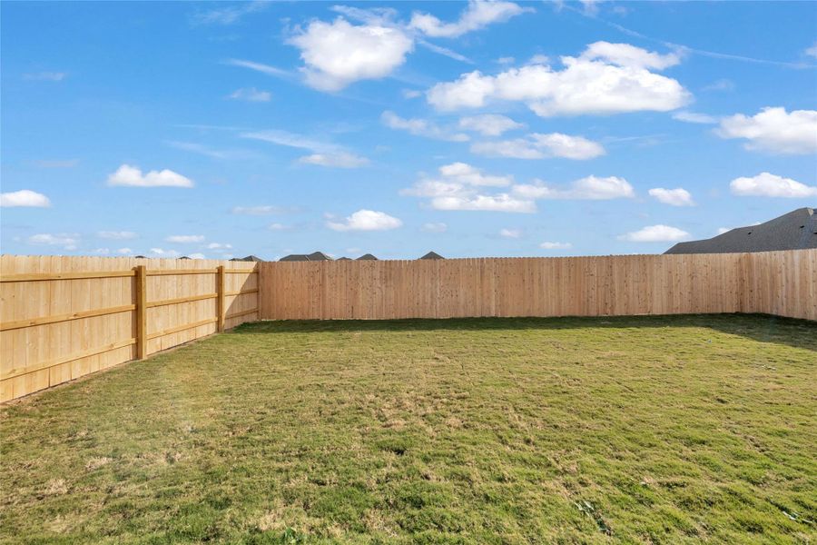 Exterior details and patio area of a home in Eastern Wells, Jarrell (Image 3).