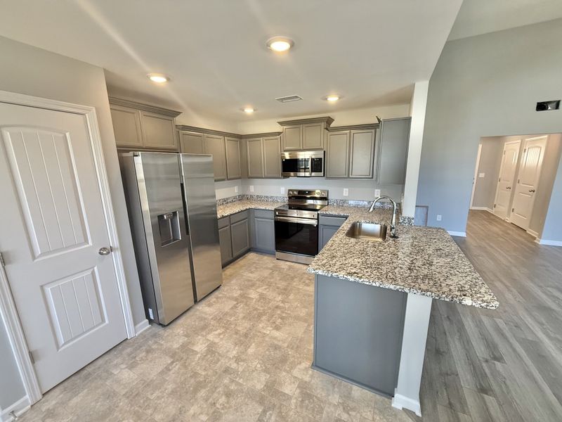 Furnished interior view inside a new home in Stonehenge, Manchester (Image 3).
