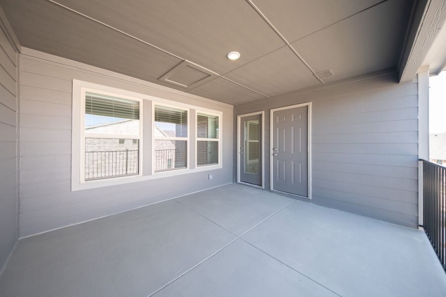 Exterior details and patio area of a home in Bayside, Rowlett (Image 2). Exterior details and patio area of a home in Bayside, Rowlett (Image 2).