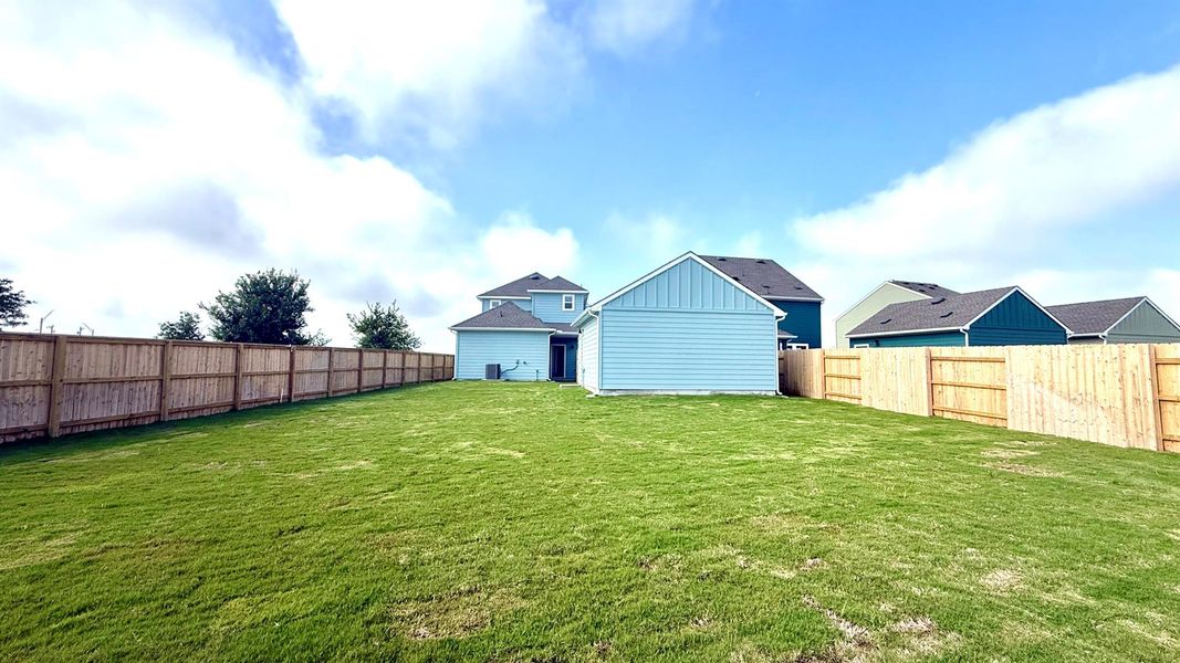 Rear of Home and Private Backyard
