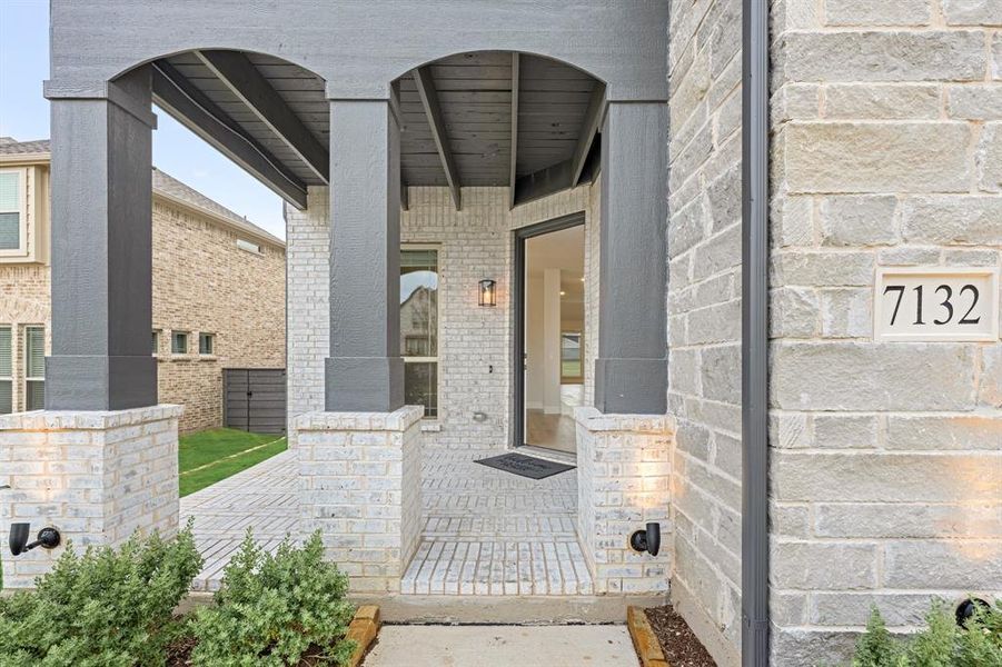Exterior details and patio area of a home in Union Park Classic 55, Little Elm (Image 19).