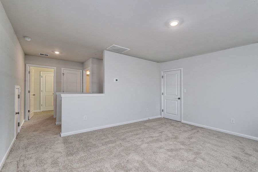 Spacious, unfurnished interior of a new home in Hainer Place, Conway (Image 38).