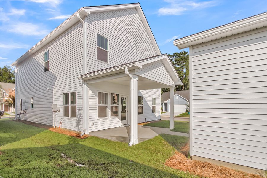 Exterior details and patio area of a home in Six Oaks, Summerville (Image 26).