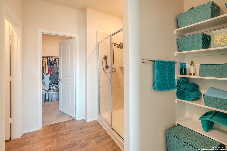 Furnished interior view inside a new home in The Links at River Bend, Floresville (Image 33).