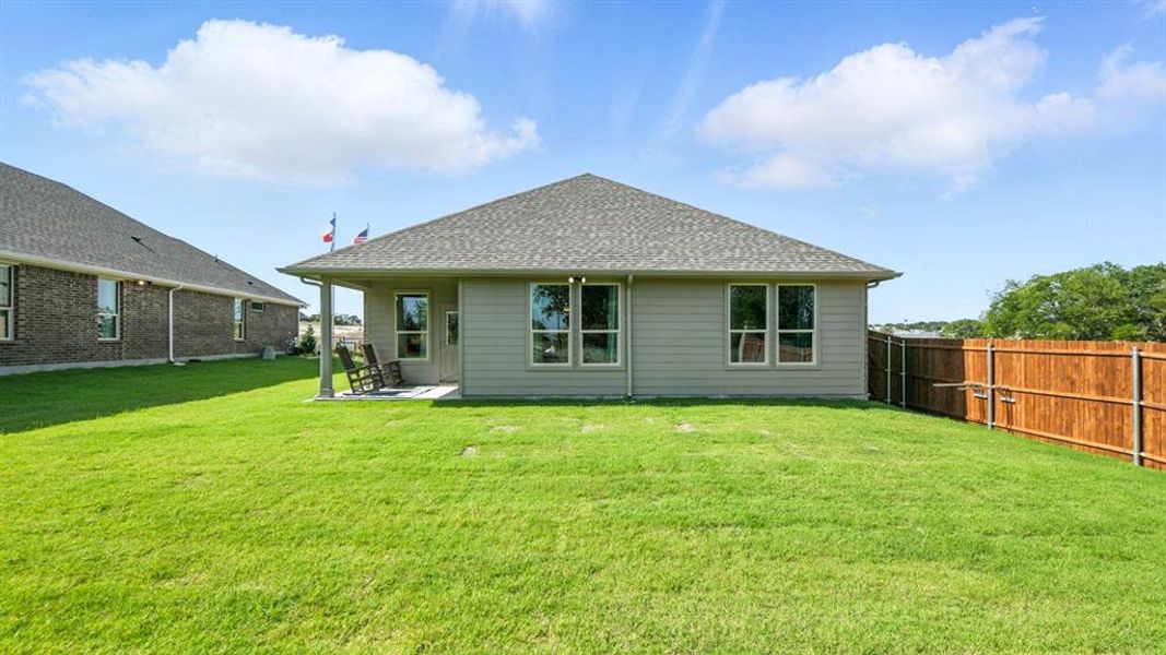Backyard- 
All Home and community information, including pricing, included features, terms, availability and amenities, are subject to change at any time without notice or obligation. All Drawings, pictures, photographs, video, square footages, floor plans, elevations, features, colors and sizes are approximate for illustration purposes only and will vary from the homes as built.