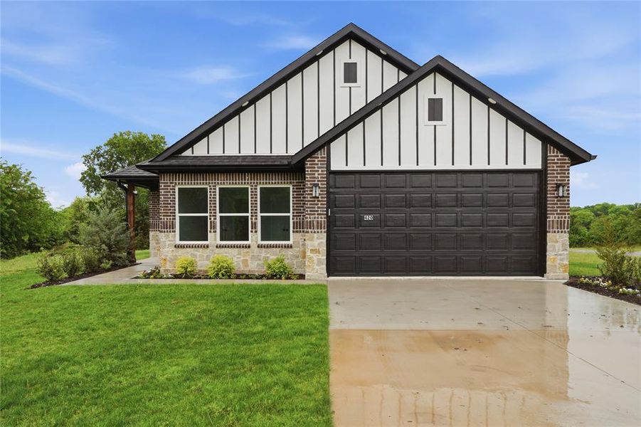 Front exterior of a new home in , Tom Bean, TX, highlighting curb appeal (Image 24).