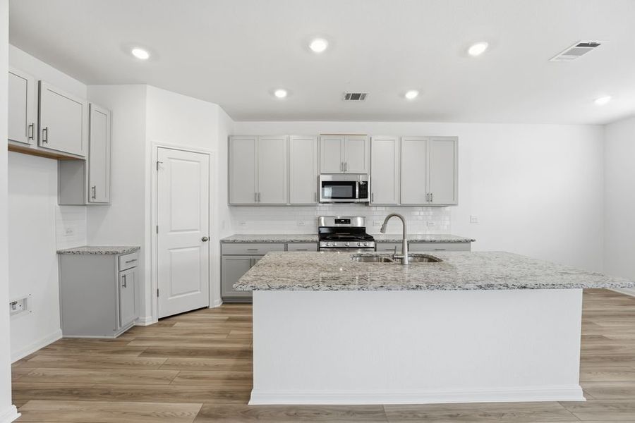 Furnished interior view inside a new home in Longview, Del Valle (Image 4).