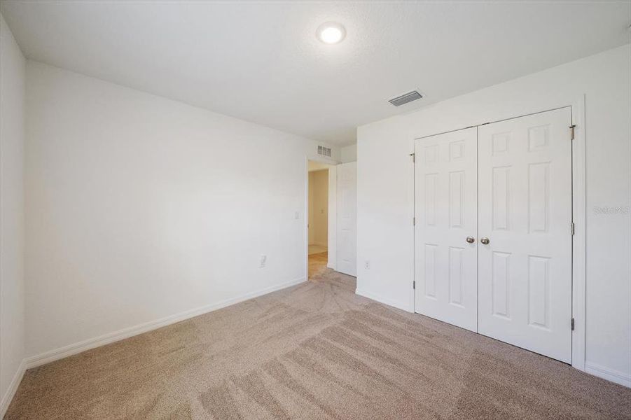 Spacious, unfurnished interior of a new home in , Port Charlotte (Image 22).