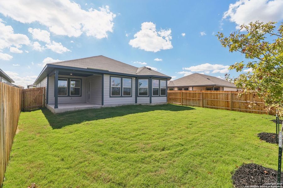 Exterior details and patio area of a home in Catalina, Converse (Image 23).