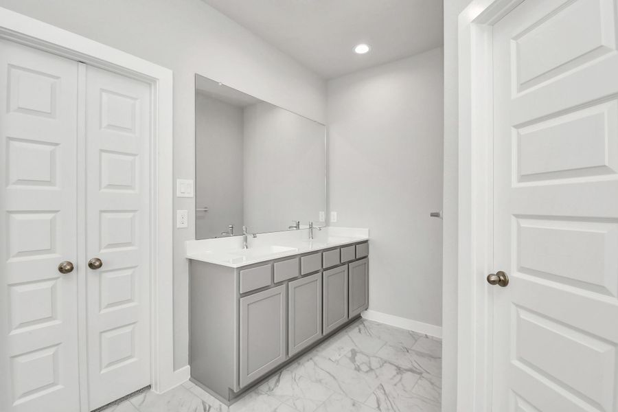 Step into a sanctuary of relaxation in your primary bathroom.