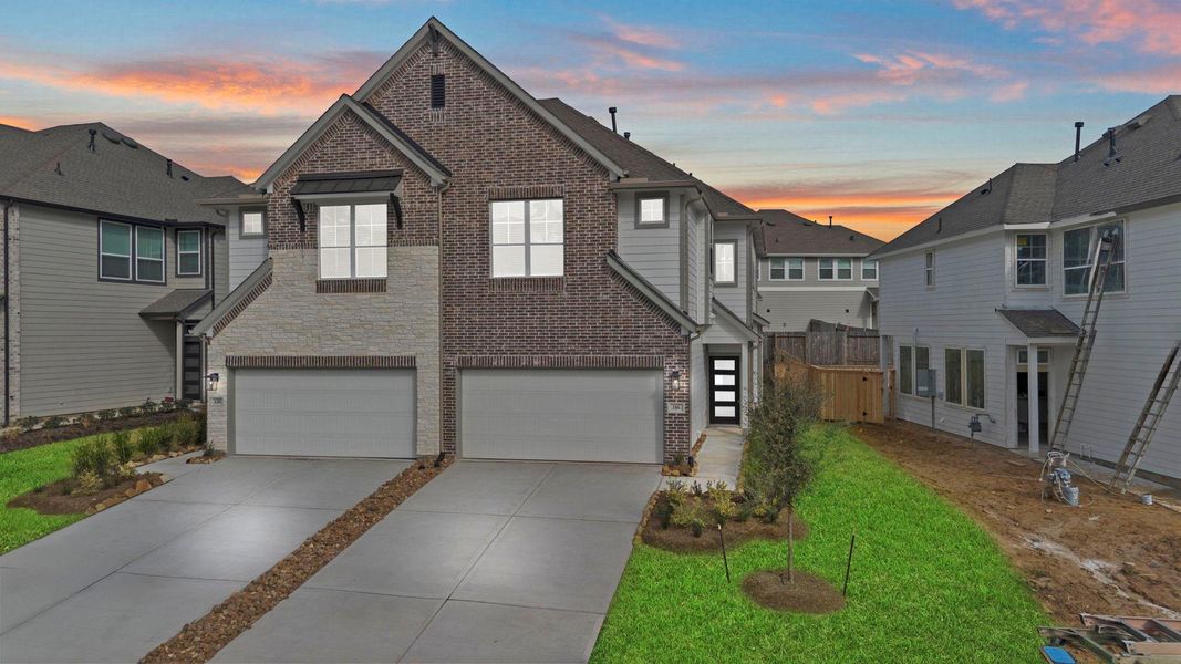 Front exterior of a new home in Woodforest, Montgomery, TX, highlighting curb appeal (Image 22). Front exterior of a new home in Woodforest, Montgomery, TX, highlighting curb appeal (Image 22).