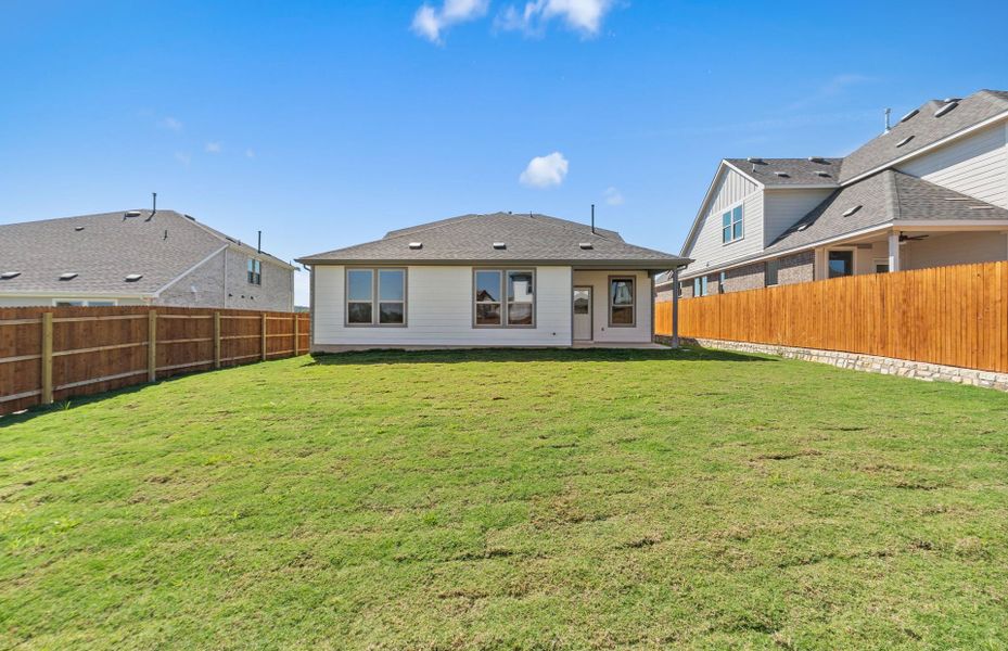 Exterior details and patio area of a home in Saddleback at Santa Rita Ranch, Liberty Hill (Image 20). Exterior details and patio area of a home in Saddleback at Santa Rita Ranch, Liberty Hill (Image 20).