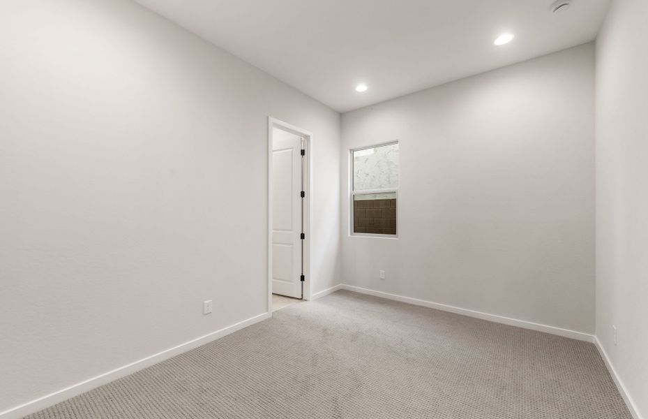 Spacious, unfurnished interior of a new home in Legado West, Queen Creek (Image 32).