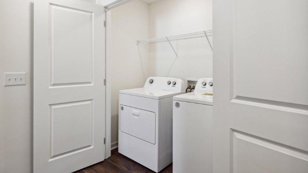 Representative furnished interior of a home built from the Altamont Townhome by D.R. Horton in Belcourt Landing, Cleveland (Image 11).