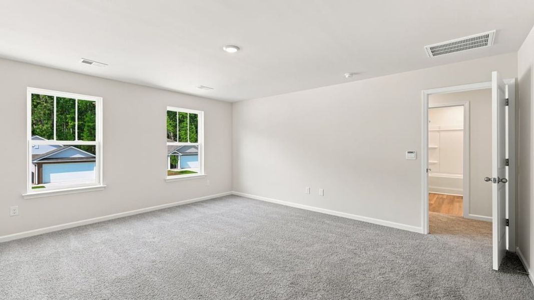 Spacious, unfurnished interior of a new home in Bentley Park, Greenwood (Image 30).