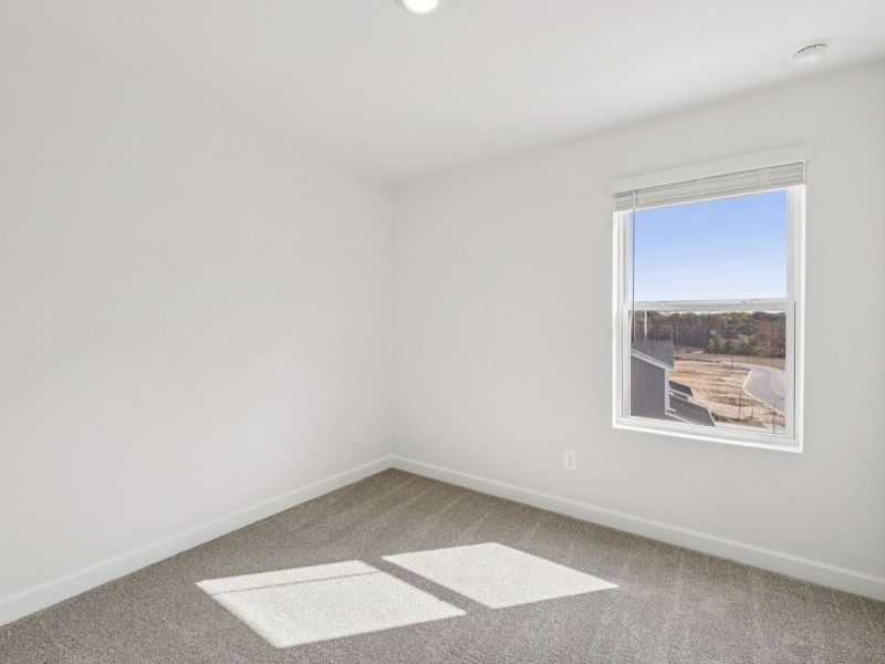 Spacious, unfurnished interior of a new home in Meadows at Wilson Farms - The Heights Series, Fort Mill (Image 19). Spacious, unfurnished interior of a new home in Meadows at Wilson Farms - The Heights Series, Fort Mill (Image 19).