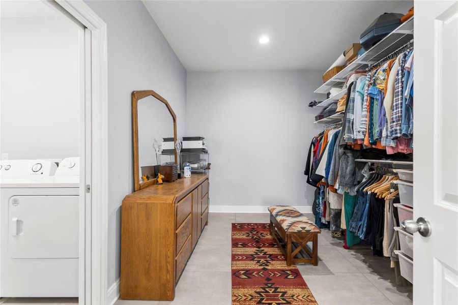 Primary Bedroom Walk in closet, located just off Laundry room.