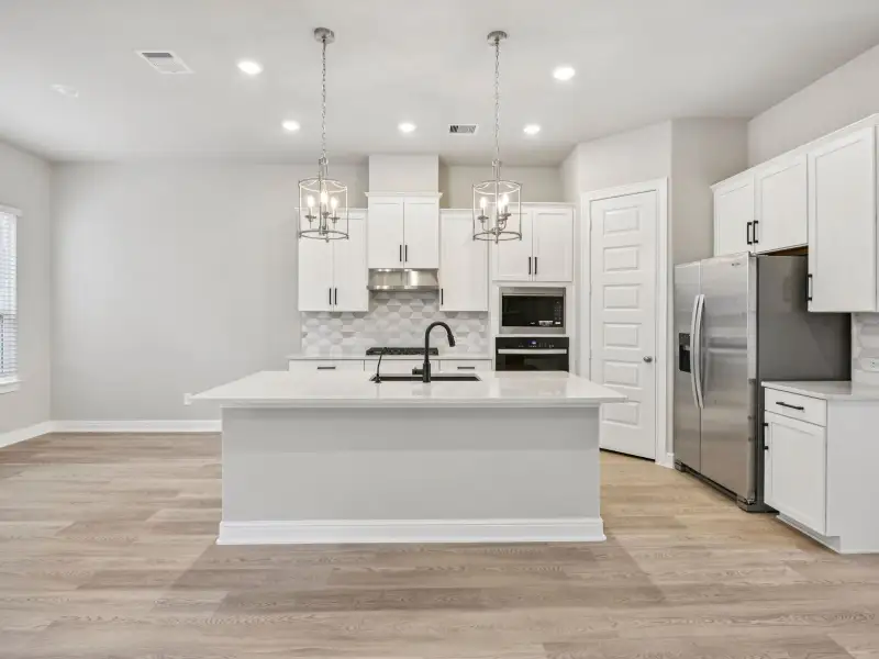 Furnished interior view inside a new home in Pinewood Trails - Luxe Series, Atascocita (Image 3). Furnished interior view inside a new home in Pinewood Trails - Luxe Series, Atascocita (Image 3).
