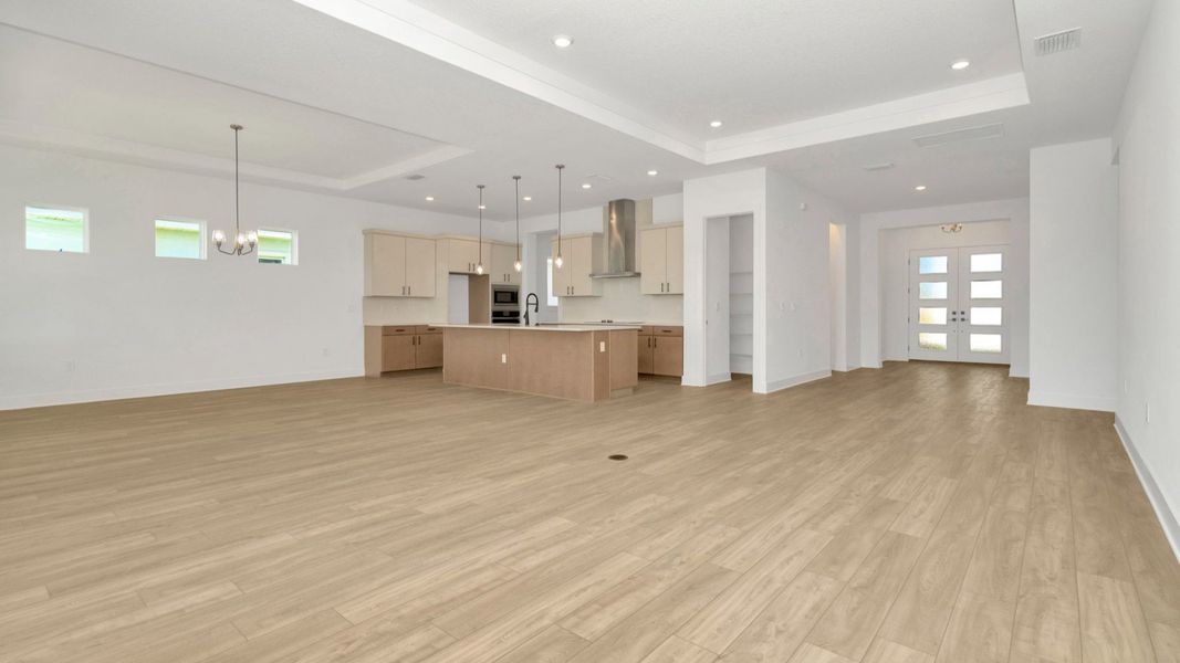 The Main Floor of a DRB Homes Grand Hawk which is offered as a home plan at Serengeti in Spring Hill, FL.