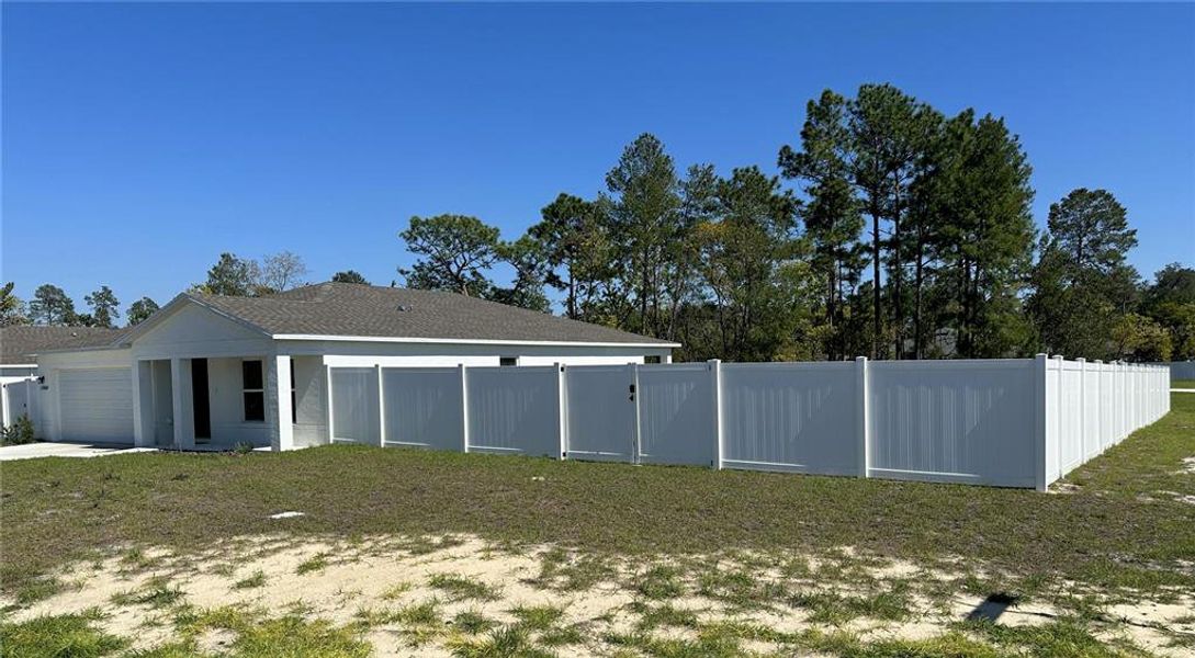 Exterior details and patio area of a home in Marion Oaks, Ocala (Image 26).
