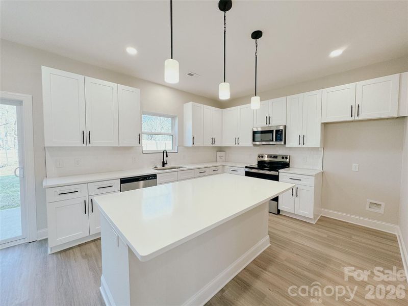 Furnished interior view inside a new home in , Huntersville (Image 5).