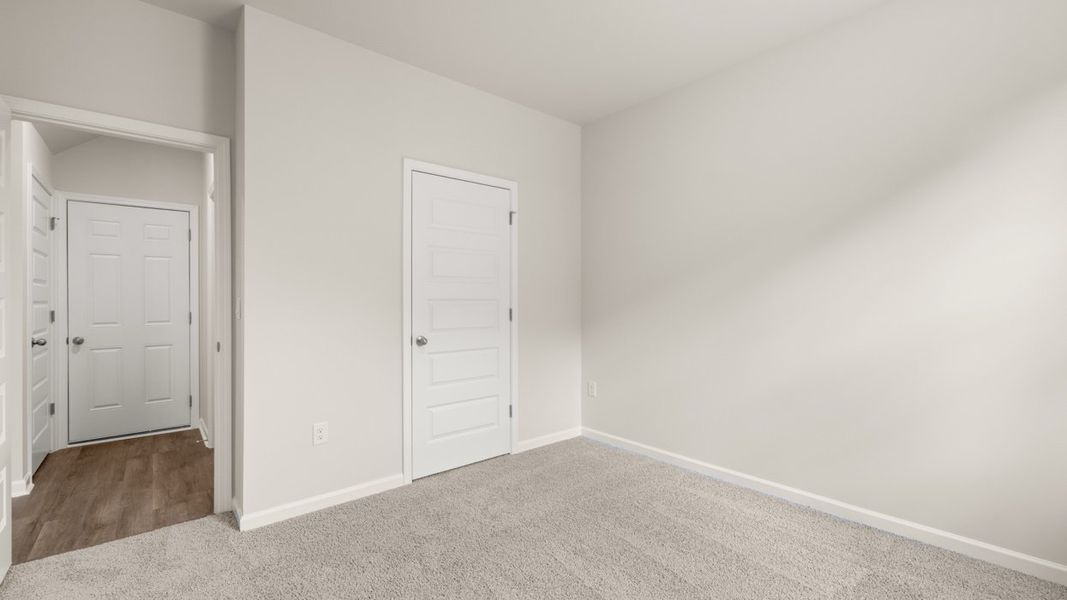 Spacious, unfurnished interior of a new home in Preserve at Dove Creek, Statham (Image 17).