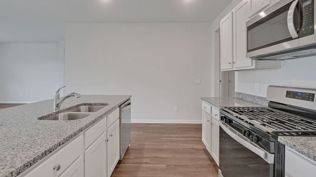 Representative furnished interior of a home built from the CALI by D.R. Horton in Vineyard Trail, Jacksonville (Image 7).