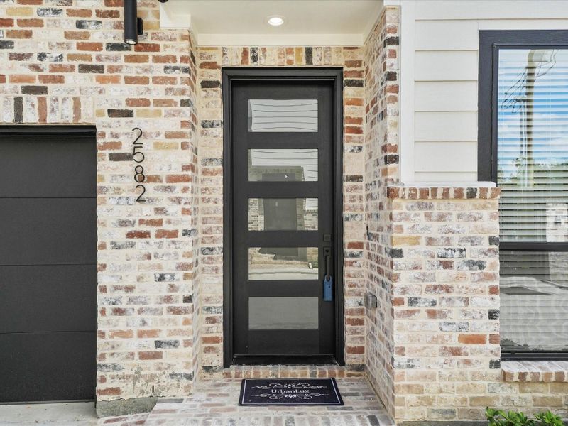 Exterior details and patio area of a home in , Houston (Image 2). Exterior details and patio area of a home in , Houston (Image 2).