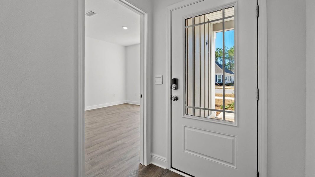 Representative unfurnished interior of a home built from the Camden by D.R. Horton in Owl's Head Farms, Freeport (Image 11).
