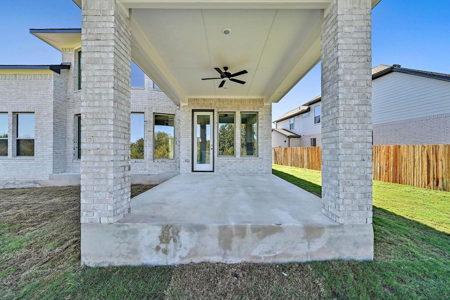 Exterior details and patio area of a home in Santa Rita Ranch - 60', Liberty Hill (Image 21).
