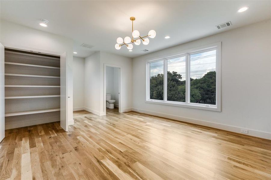 Gameroom or exercise room with views of the park with half bath