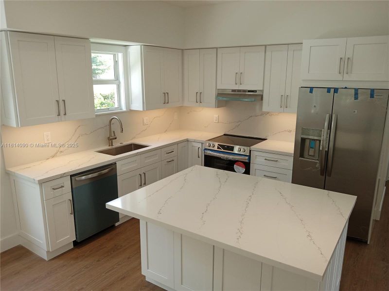Furnished interior view inside a new home in , Coral Gables (Image 5).