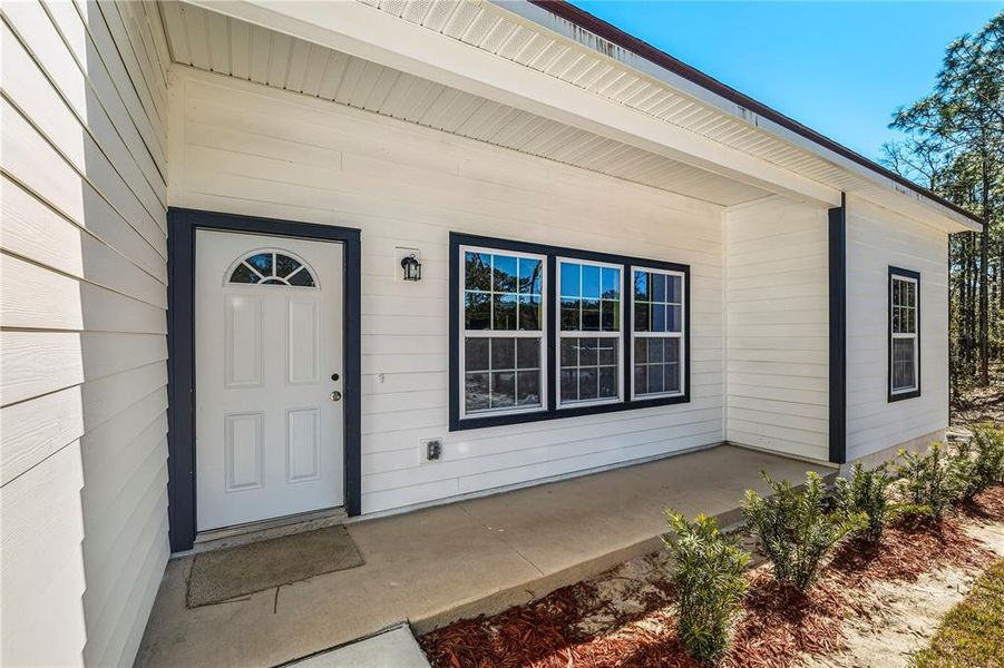 Exterior details and patio area of a home in , Keystone Heights (Image 29).