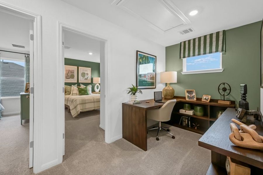 Representative furnished interior of a home built from the Robin by Taylor Morrison in Longview 50s, Del Valle (Image 12).