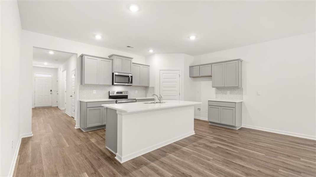 Furnished interior view inside a new home in The Reserve at Calcutta, Stockbridge (Image 8).