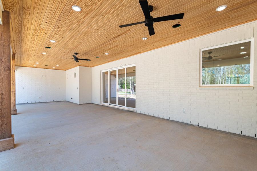 Exterior details and patio area of a home in , Splendora (Image 34).