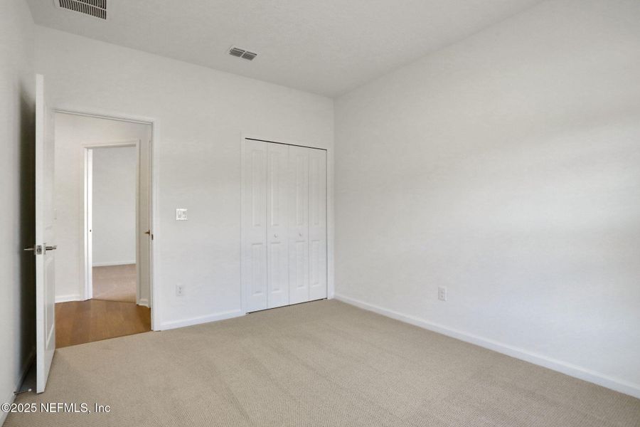 Spacious, unfurnished interior of a new home in Silver Landing at SilverLeaf, St. Augustine (Image 38).