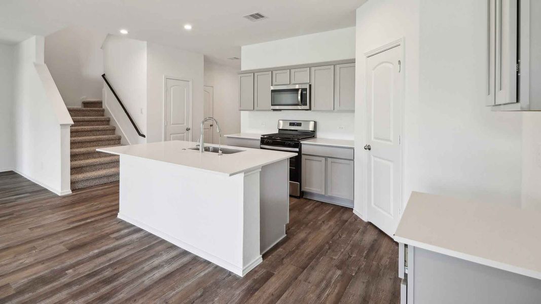 Furnished interior view inside a new home in Grand Pines, Magnolia (Image 7).