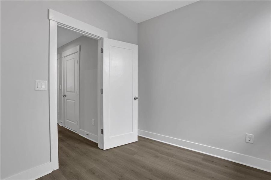 Spacious, unfurnished interior of a new home in The Paddocks at Doc Hughes, Buford (Image 29).