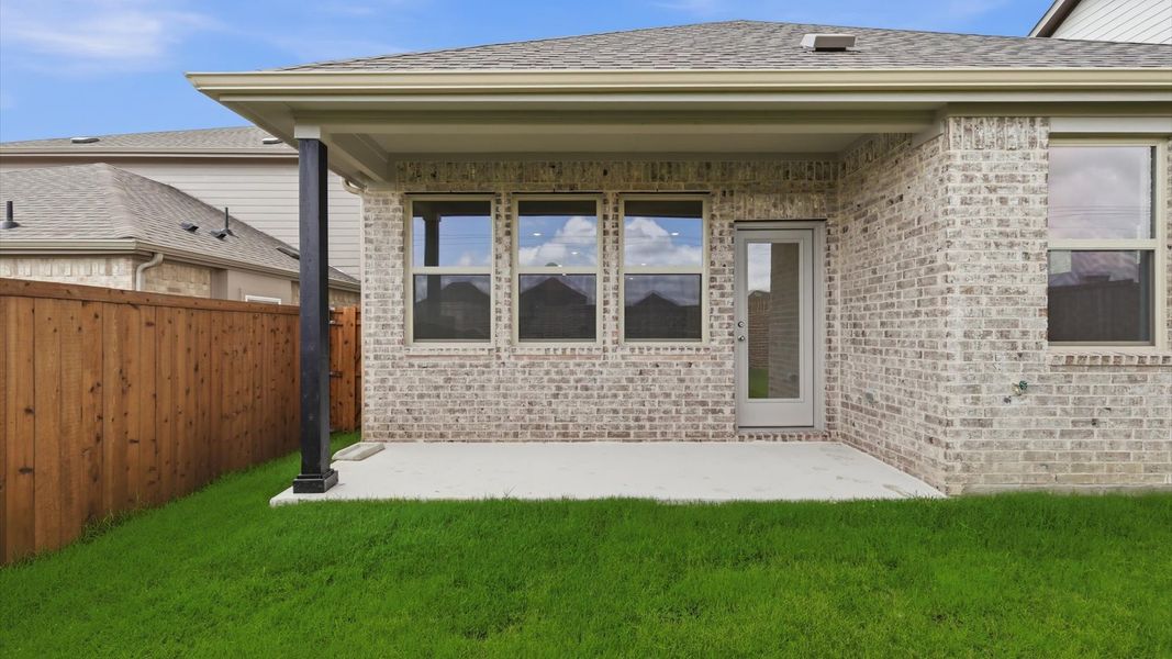 Exterior details and patio area of a home in Westridge Journey, Princeton (Image 4).