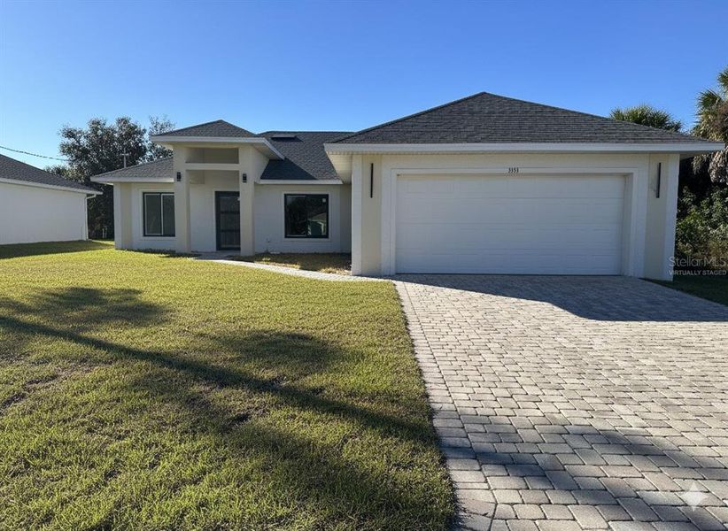 Front exterior of a new home in , Port Charlotte, FL, highlighting curb appeal (Image 1). Front exterior of a new home in , Port Charlotte, FL, highlighting curb appeal (Image 1).