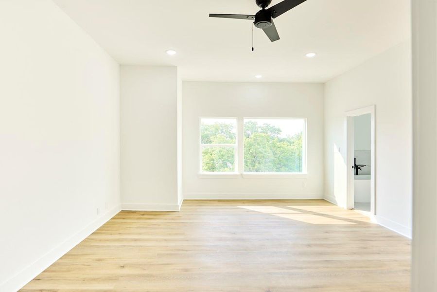 Relax in style in this expansive primary bedroom. With plenty of natural light and plenty of room for all your furniture, it’s the ultimate retreat after a long day. Featuring large windows and clean, contemporary finishes, this space is both serene and luxurious. Relax in style in this expansive primary bedroom. With plenty of natural light and plenty of room for all your furniture, it’s the ultimate retreat after a long day. Featuring large windows and clean, contemporary finishes, this space is both serene and luxurious.