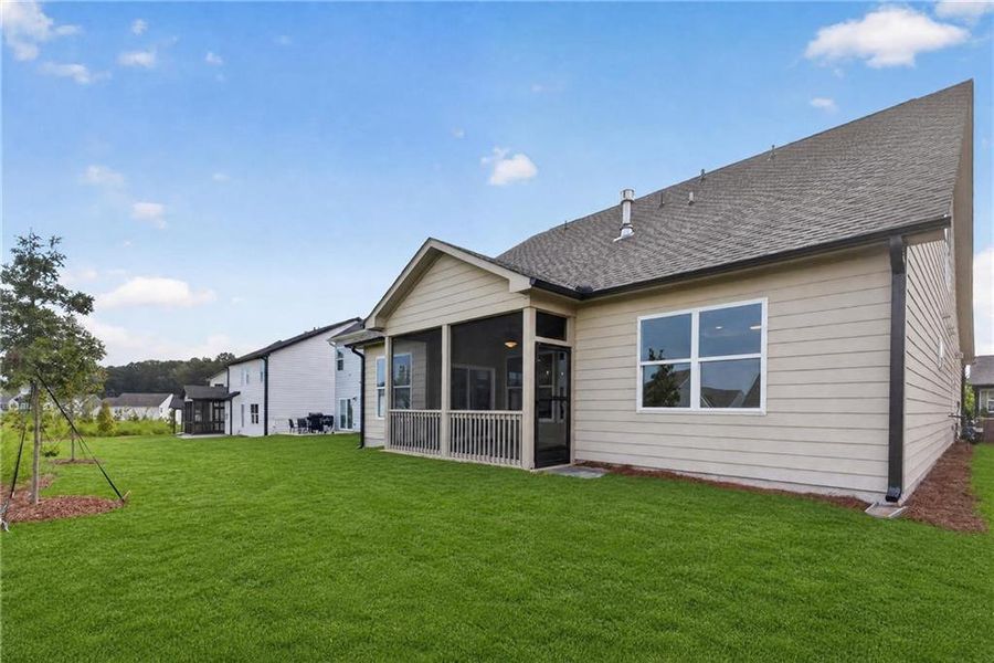 Exterior details and patio area of a home in Twin Lakes, Hoschton (Image 22).