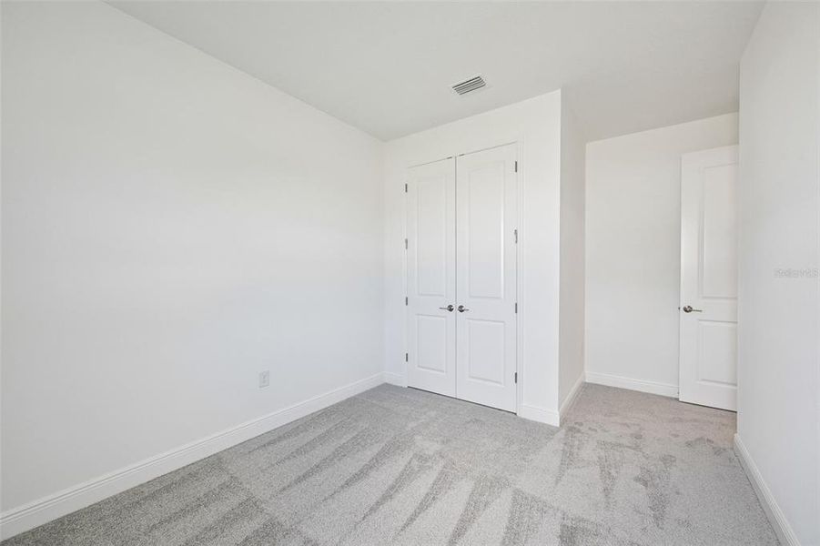 Spacious, unfurnished interior of a new home in Grand Park, Sarasota (Image 23).