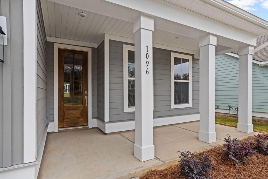 Front exterior of a new home in High Point at Foxbank, Moncks Corner, SC, highlighting curb appeal (Image 2).