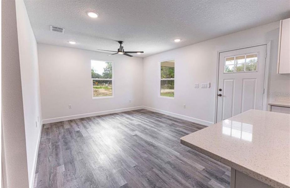 Spacious, unfurnished interior of a new home in , Lake Panasoffkee (Image 6).