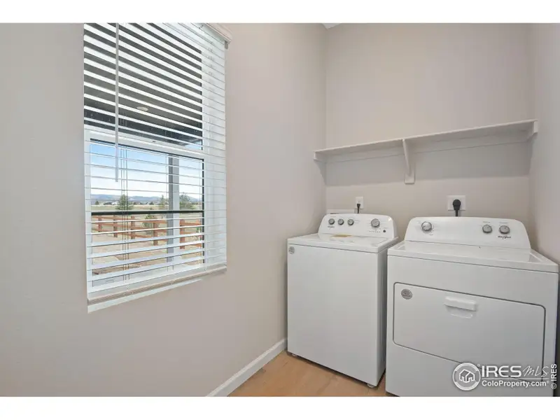 Furnished interior view inside a new home in Westside Crossing Paired Homes, Berthoud (Image 8).