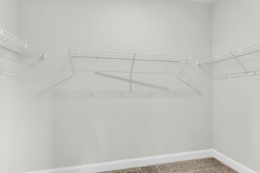 Spacious, unfurnished interior of a new home in Tidewater at Lakes of Cane Bay, Summerville (Image 42).