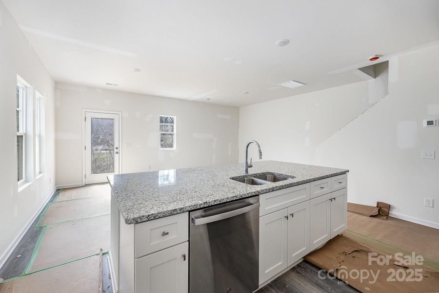 Furnished interior view inside a new home in , Statesville (Image 7).